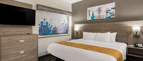 Suite, 1 cama King size y sofá cama, con acceso para personas discapacitadas, para no fumadores | Minibar, escritorio, cortinas blackout y tabla de planchar con plancha