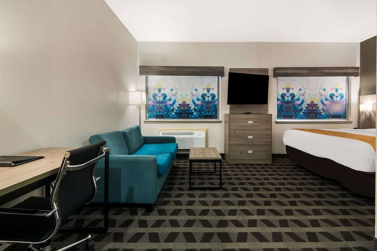 Minibar, desk, blackout drapes, iron/ironing board