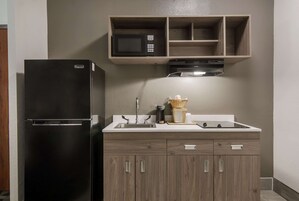 Suite, 1 cama de matrimonio grande, no fumadores | Minibar, escritorio, cortinas opacas y tabla de planchar con plancha
