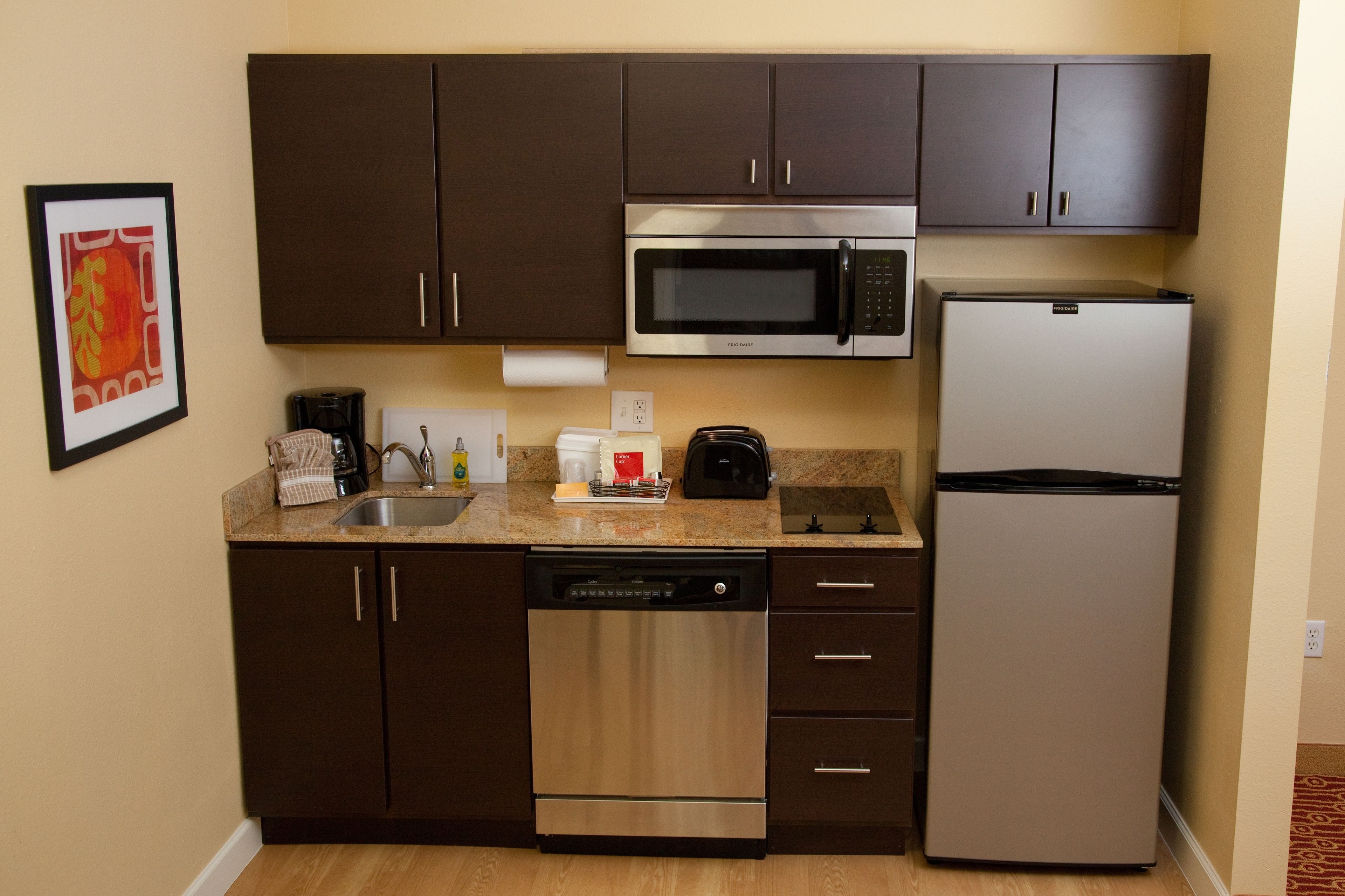 full-sized fridge, microwave, stovetop, dishwasher
