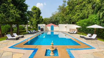 Outdoor pool, pool umbrellas, pool loungers