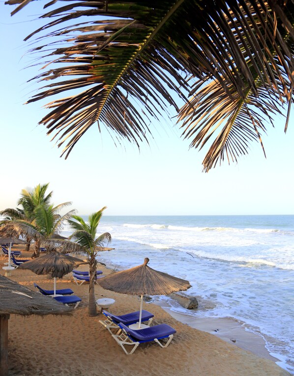 Sun-loungers, beach umbrellas, beach volleyball