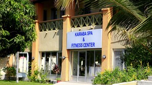 A building with a sign reading "Kairaba Spa & Fitness Center". - The Kairaba Beach Hotel (Serrekunda)