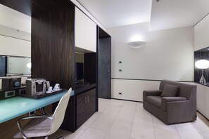 Premium bedding, down comforters, minibar, in-room safe