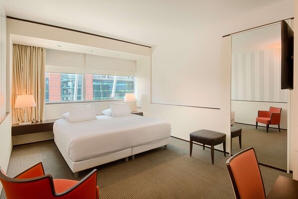 Premium bedding, down duvets, minibar, in-room safe