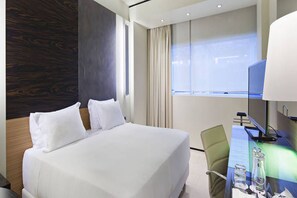 Premium bedding, down duvets, minibar, in-room safe