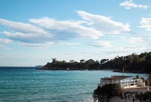 Private beach, white sand, beach towels, beach bar