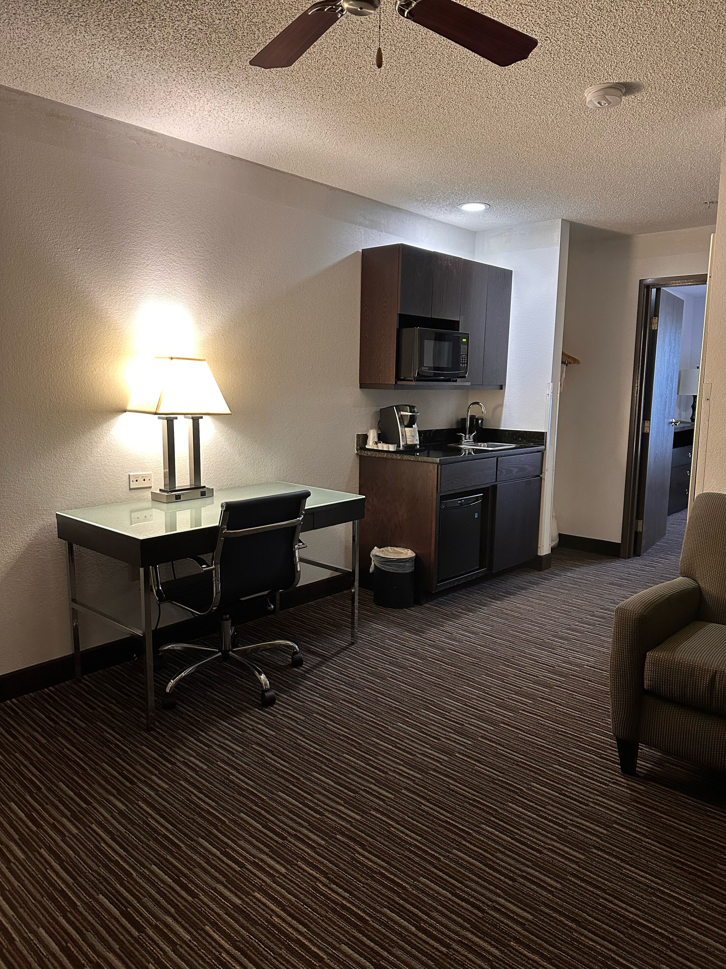 Suite, 1 Bedroom | Living area | 32-inch LCD TV with cable channels, TV, first-run movies