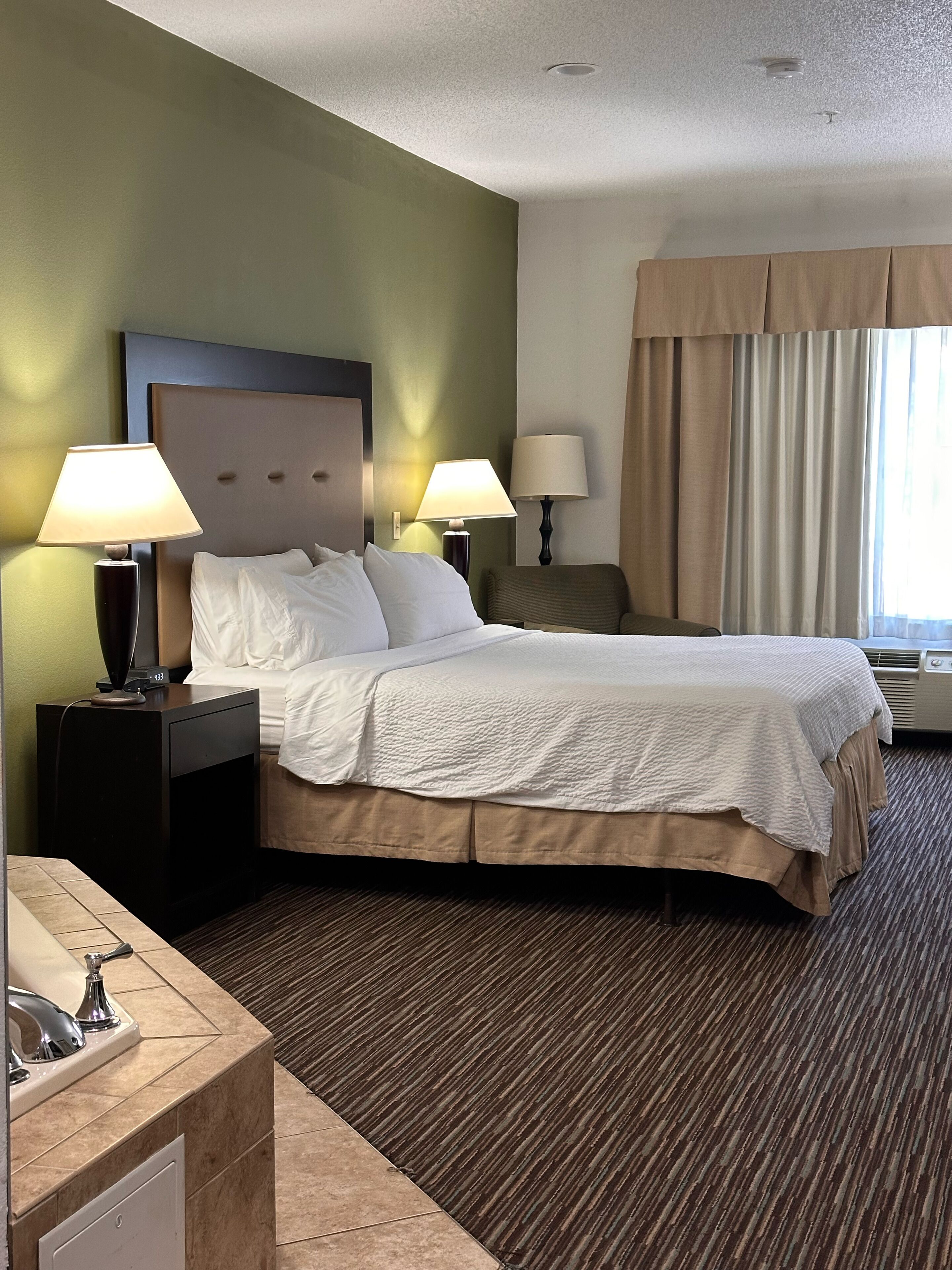 suite, 1 bedroom, jetted tub | 1 bedroom, premium bedding, in-room safe, desk