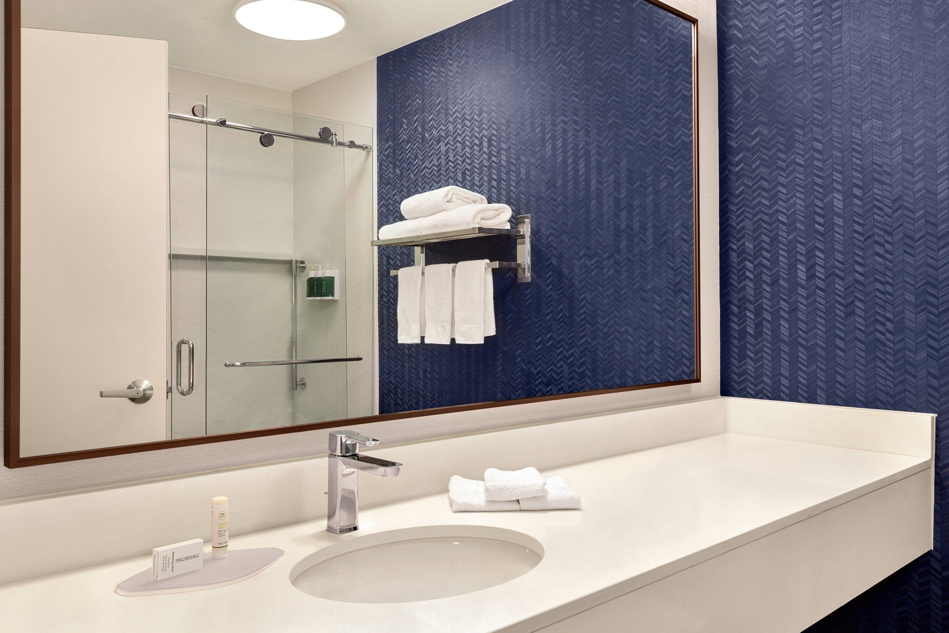 combined shower/bathtub, free toiletries, hair dryer, towels