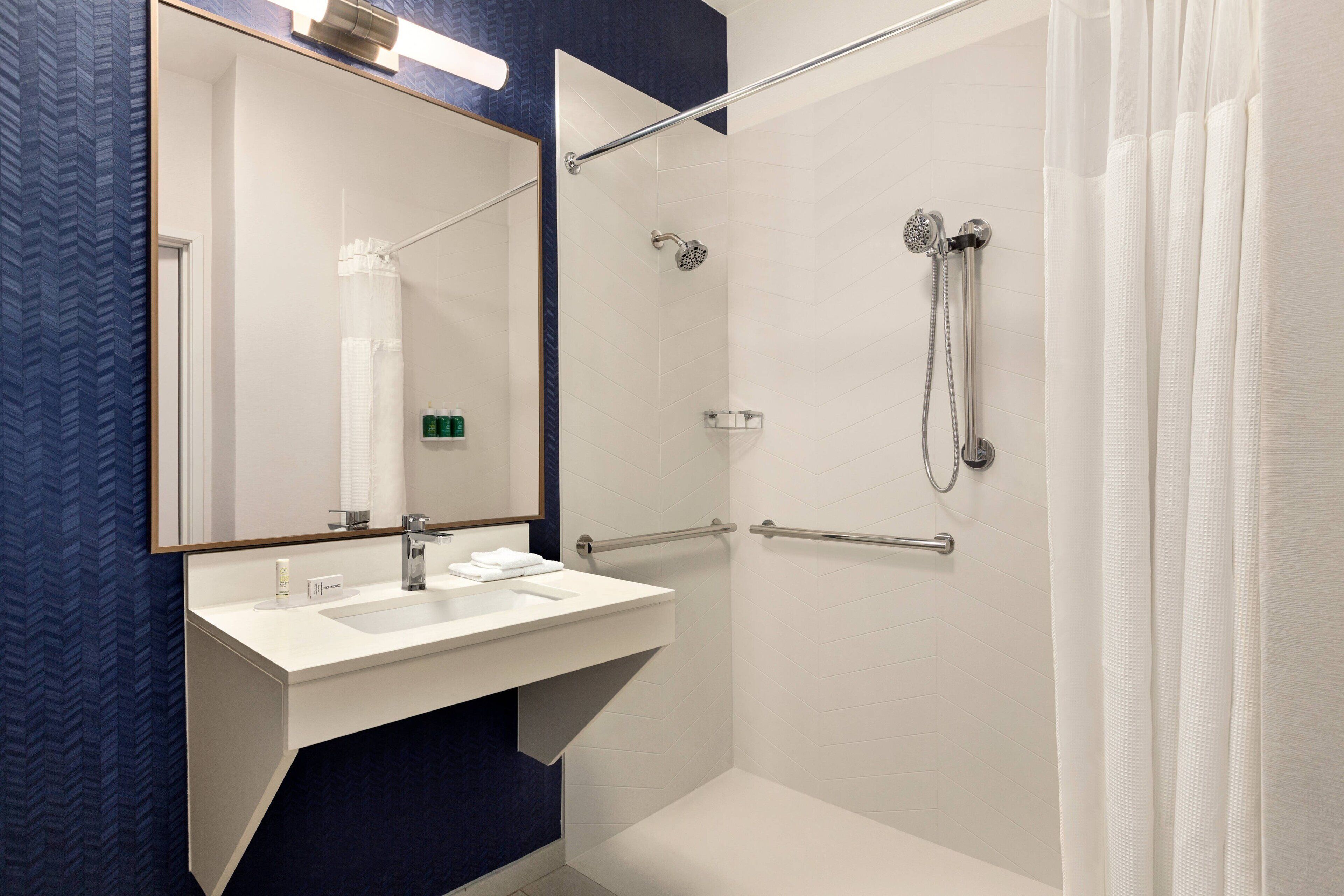 combined shower/bathtub, free toiletries, hair dryer, towels