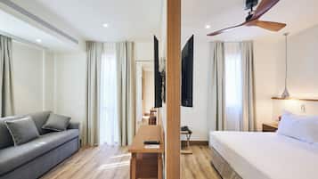 Junior Suite | Minibar, in-room safe, iron/ironing board, free WiFi