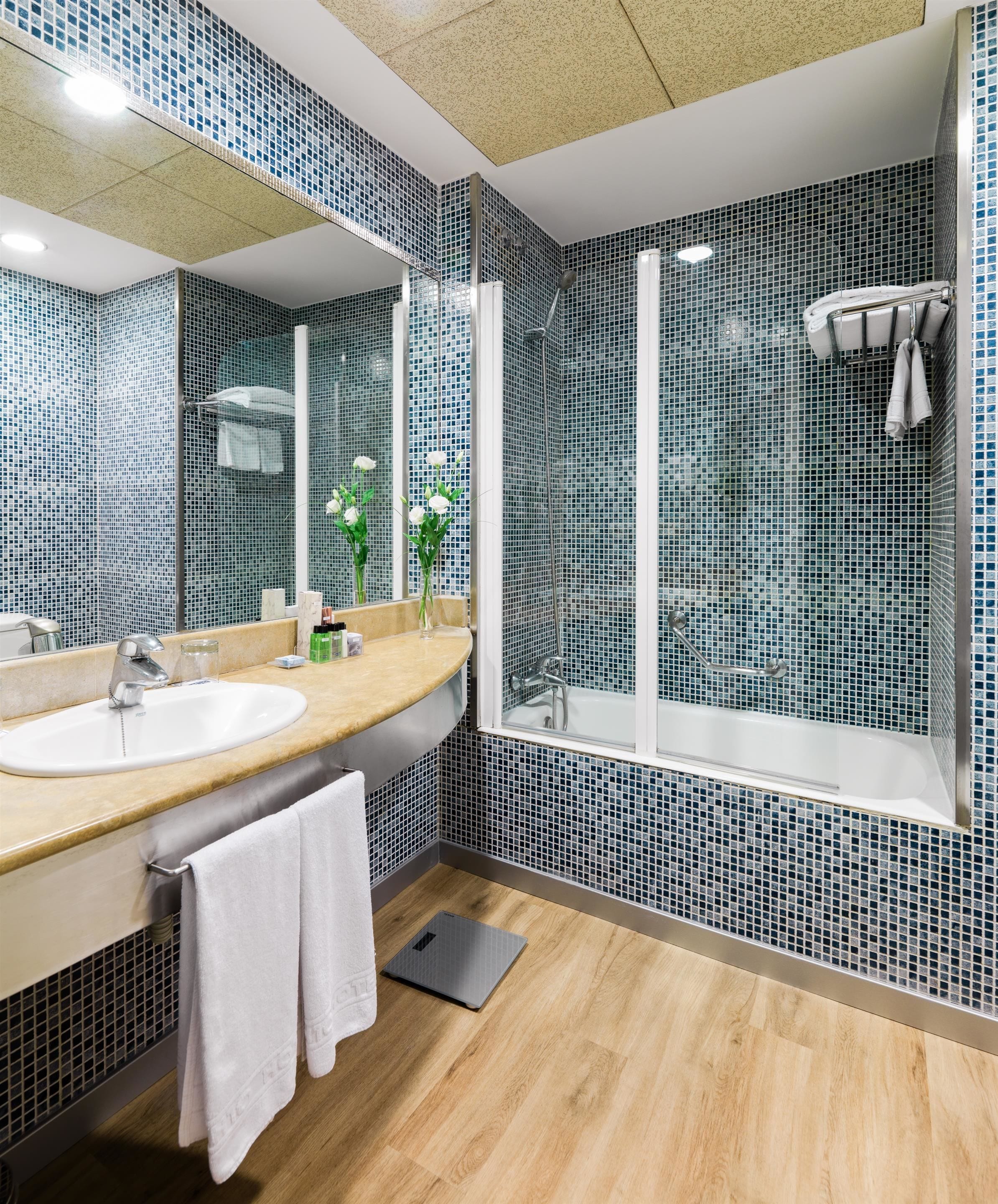 eco-friendly toiletries, hair dryer, bidet, towels