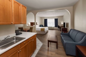 Suite, 1 King Bed, Non Smoking | 1 bedroom, individually decorated, individually furnished, desk