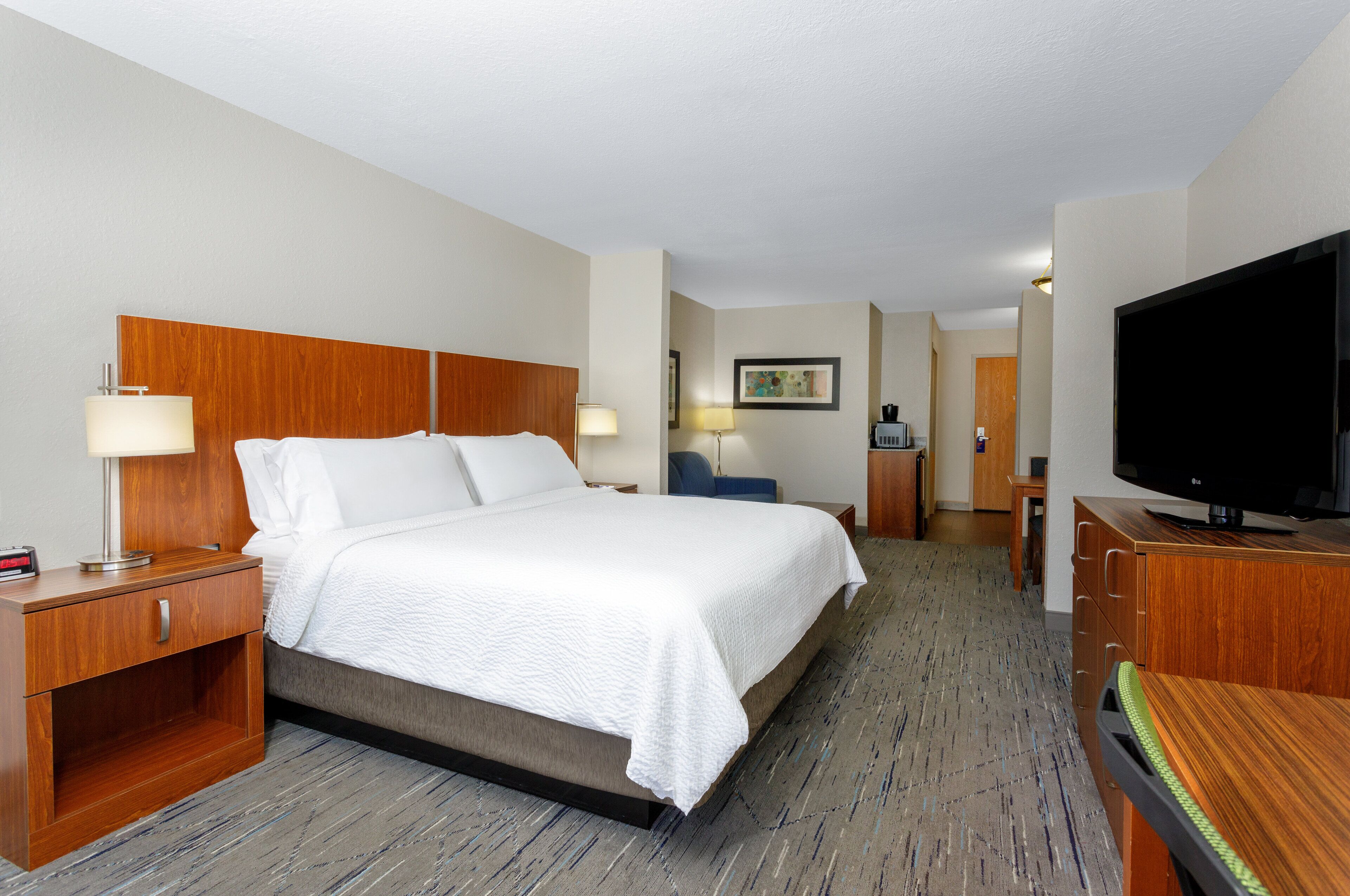 Suite, 1 kingsize bed | Een bureau, een strijkplank/strijkijzer, gratis wifi, beddengoed