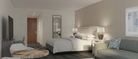 Una habitación de hotel moderna con cama, sofá, televisión, escritorio y silla.