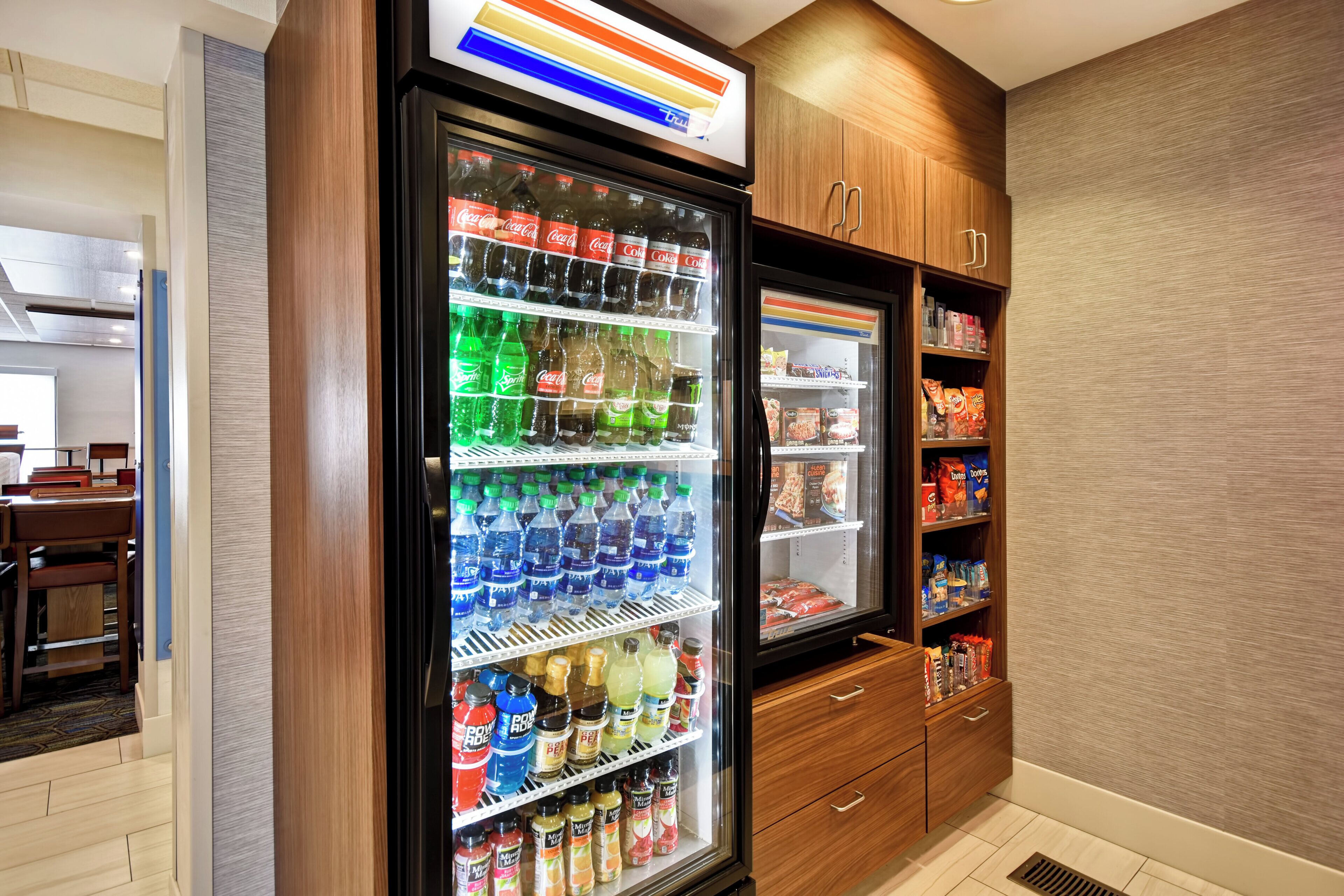 A vending machine with various beverages and snacks.