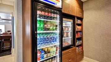 A vending machine with various beverages and snacks.