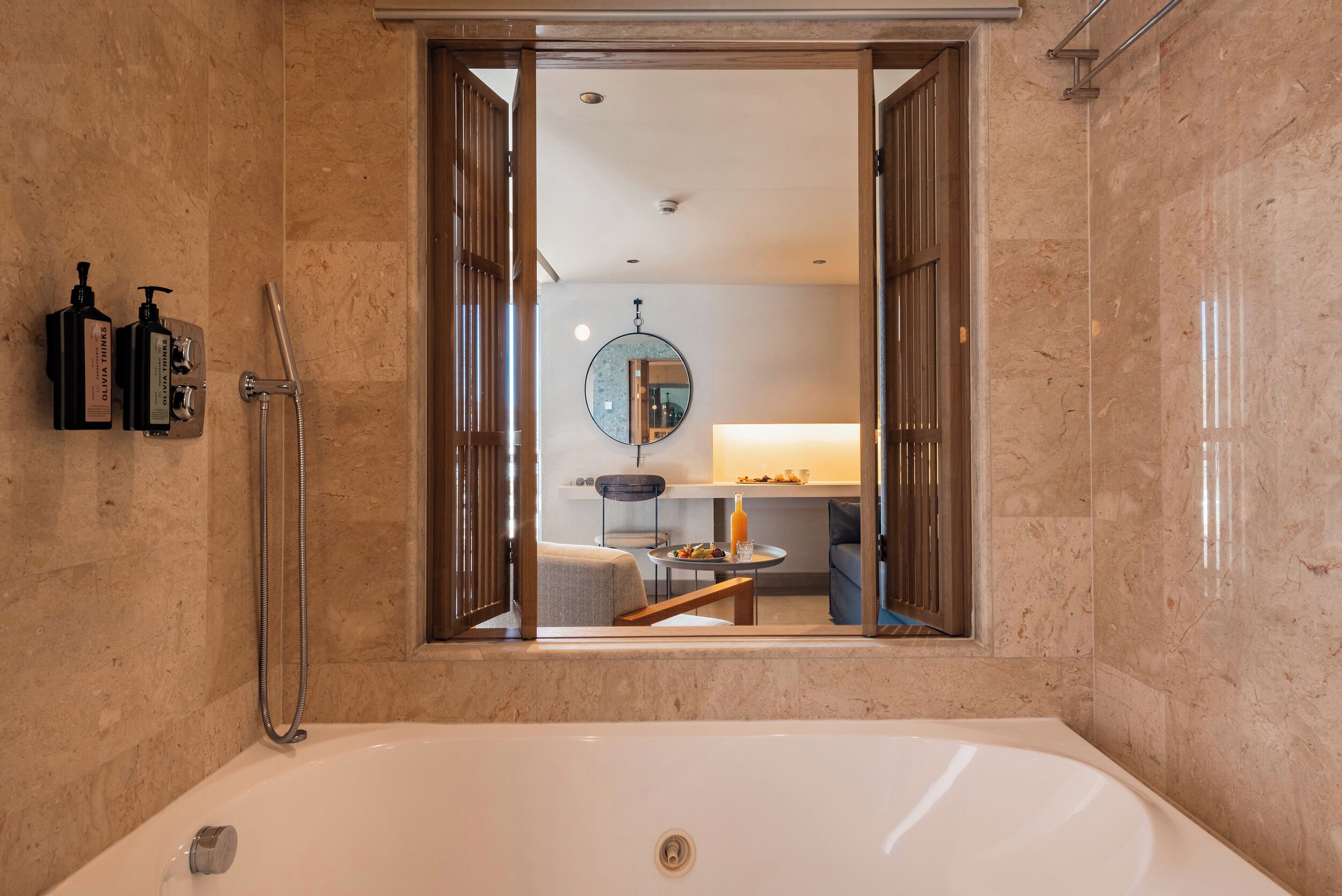 suite | bathroom | rainfall showerhead, free toiletries, hair dryer, bathrobes