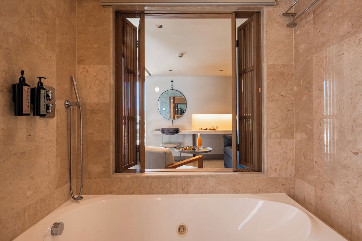 suite | bathroom | rainfall showerhead, free toiletries, hair dryer, bathrobes