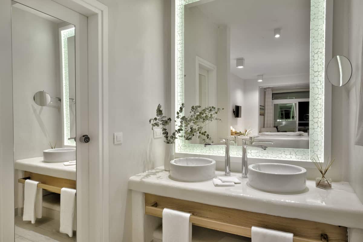 mediterranean villa suite, two bedrooms | 2 bedrooms, minibar, in-room safe, individually decorated