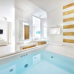 Nissaki VIP Suite with Indoor and Outdoor Hot Tub, Sea View | Bathroom | Designer toiletries, hair dryer, bathrobes, slippers