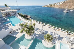 Seasonal outdoor pool, pool umbrellas, pool loungers