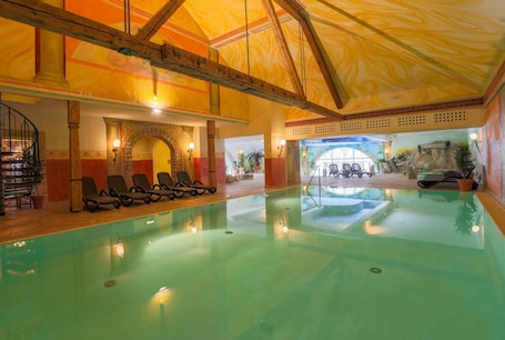 Indoor pool, open 7:00 AM to 9:00 PM, sun loungers