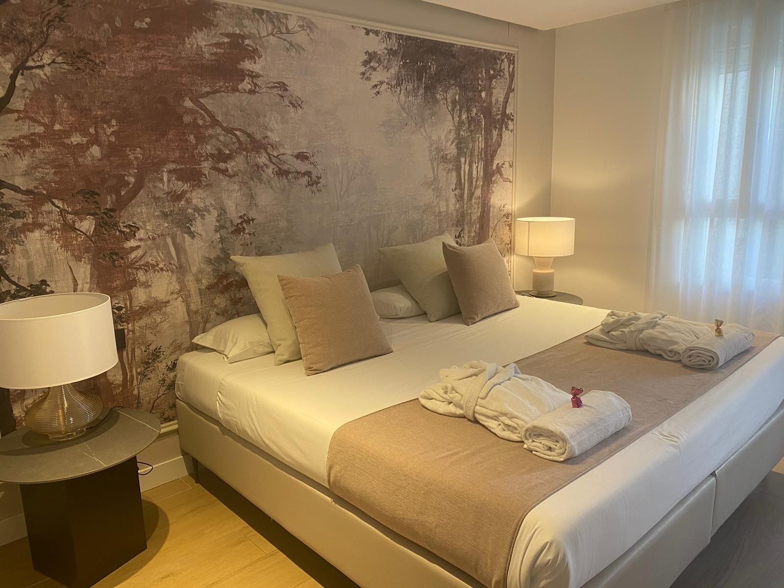 deluxe room with jacuzzi | in-room safe, desk, soundproofing, iron/ironing board