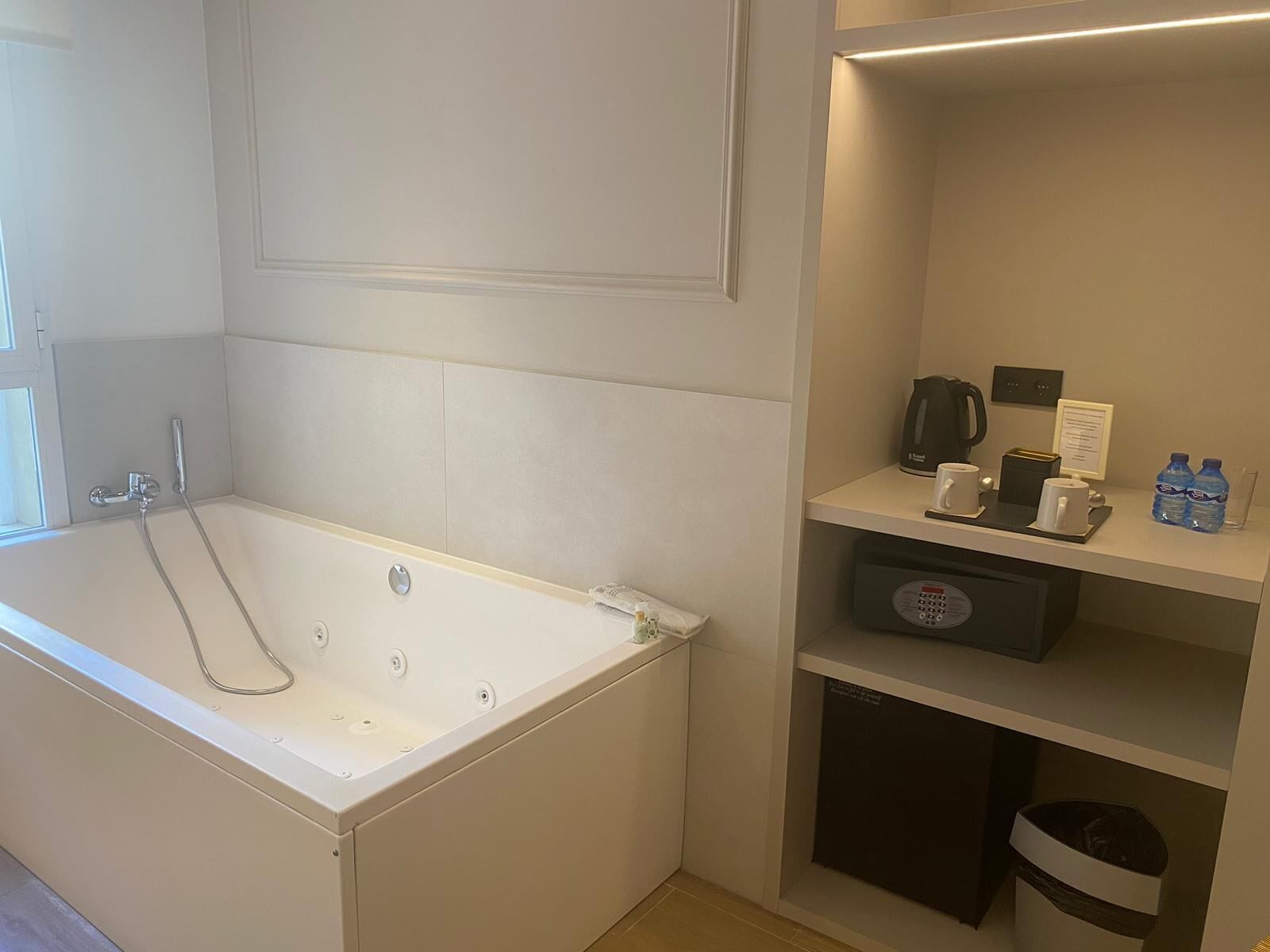 deluxe room with jacuzzi | in-room safe, desk, soundproofing, iron/ironing board