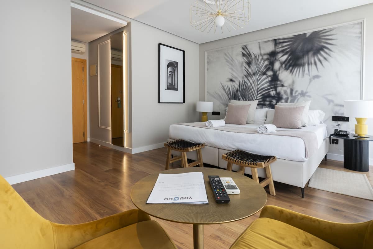 superior comfort room | in-room safe, desk, soundproofing, iron/ironing board