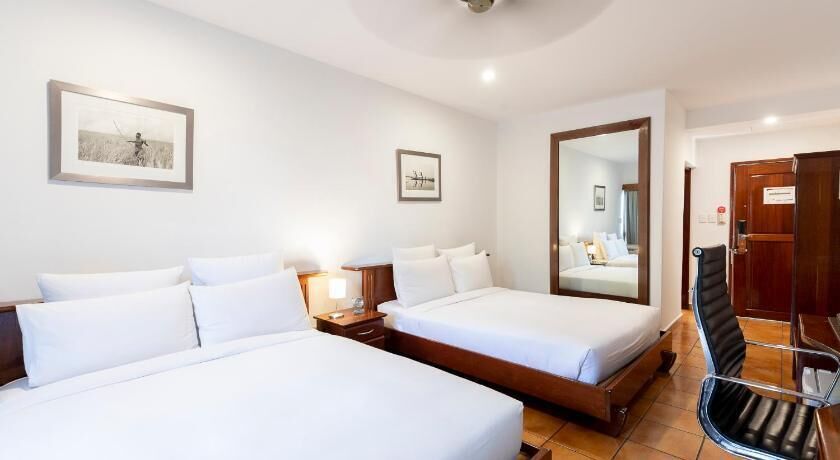 Premium bedding, down duvets, in-room safe, desk