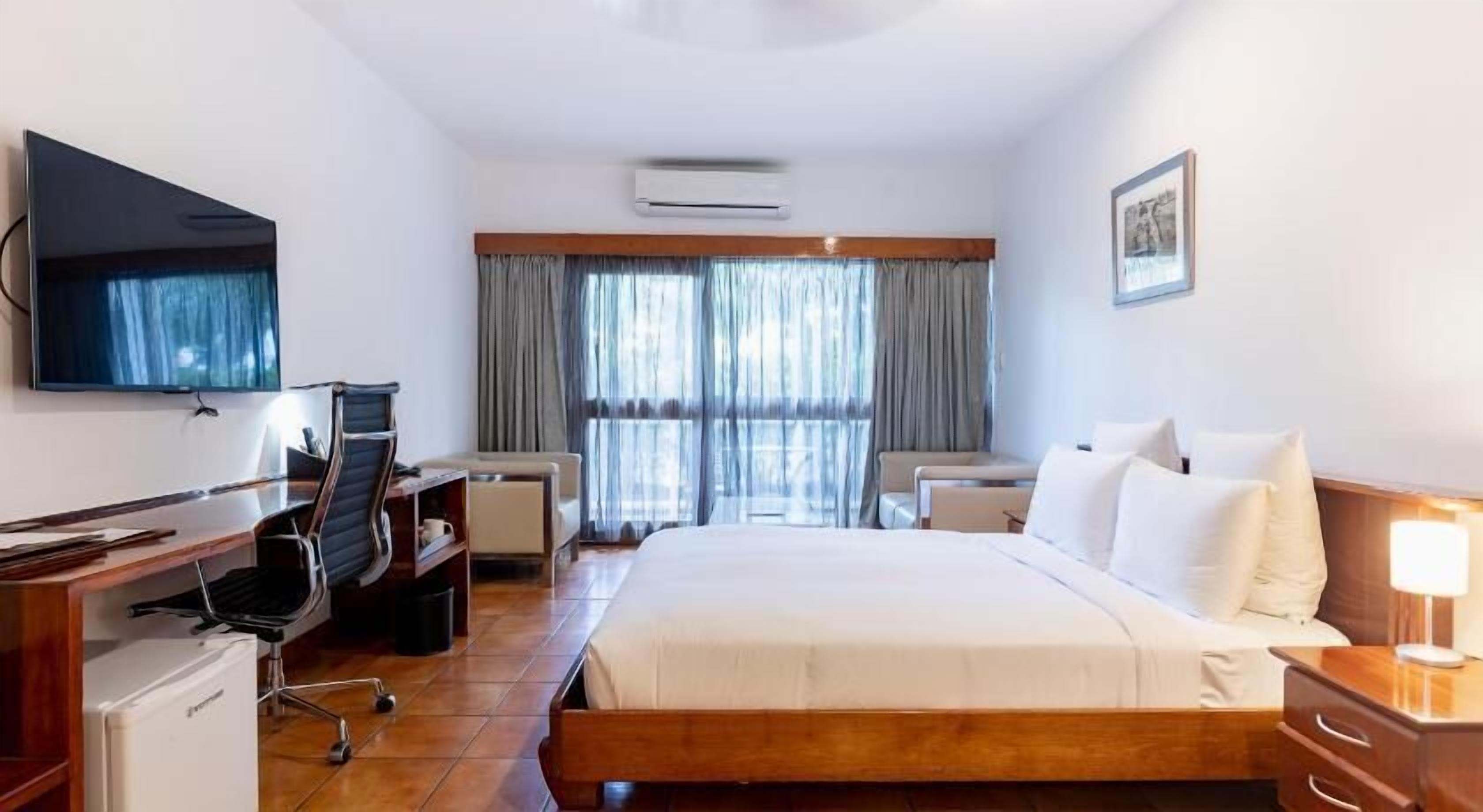 Premium bedding, down duvets, in-room safe, desk