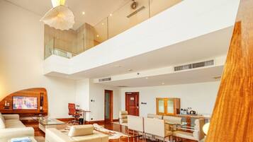 Dakota Suite | Living area | 50-inch Smart TV with cable channels, TV