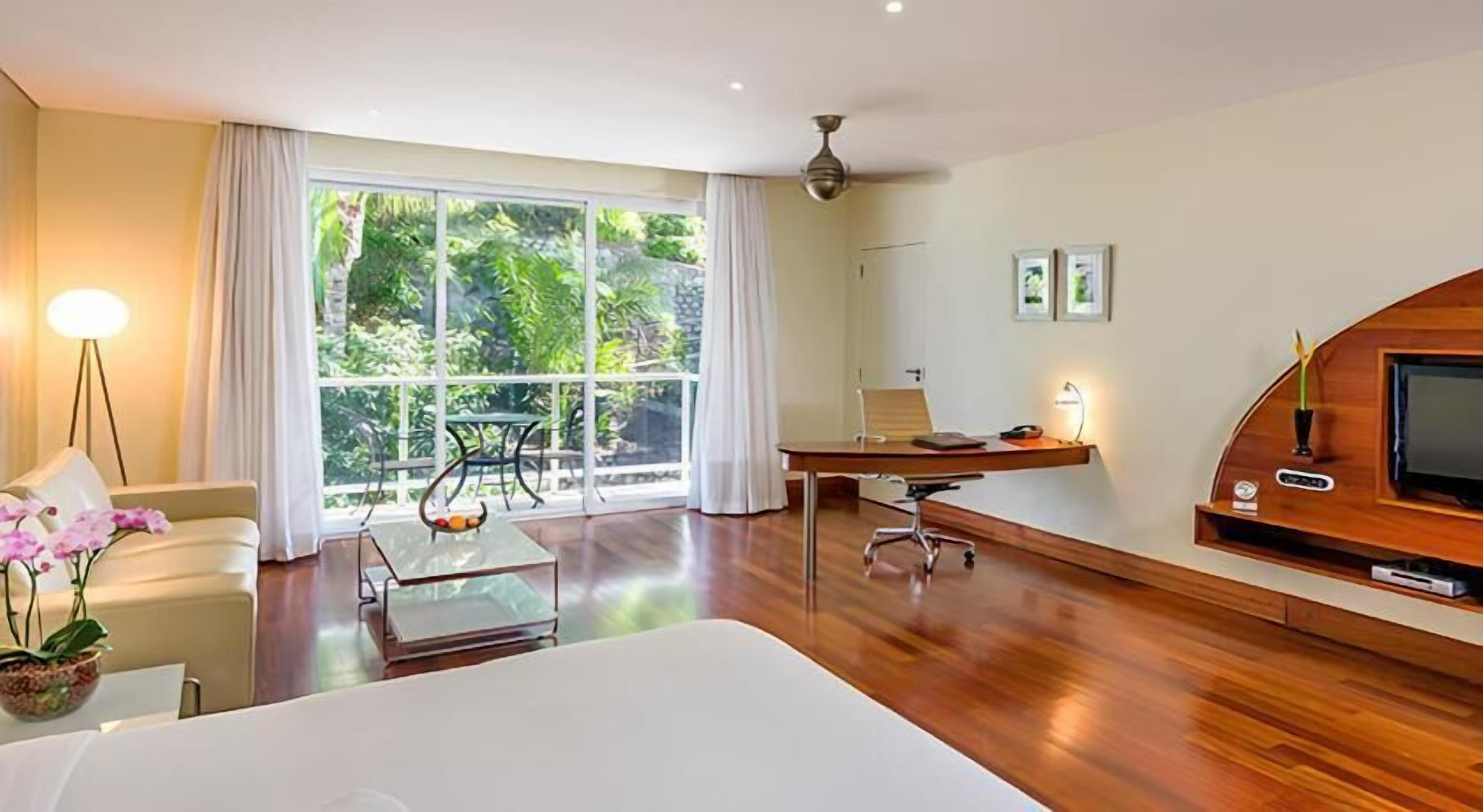 Premium bedding, down duvets, in-room safe, desk