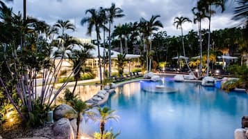 Outdoor pool, open 7:00 AM to 9:00 PM, pool loungers