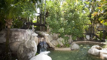 Outdoor pool, open 7:00 AM to 9:00 PM, pool loungers
