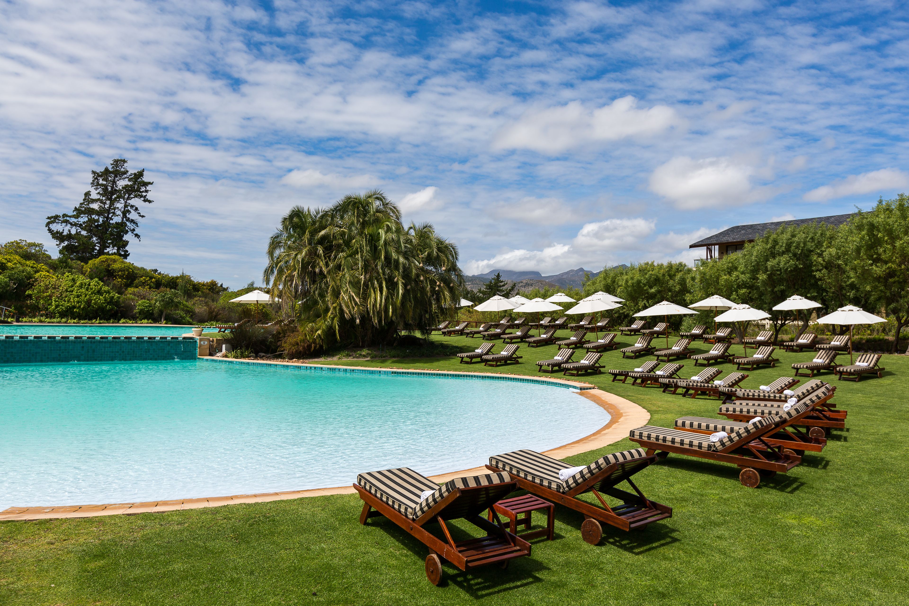 Indoor pool, seasonal outdoor pool, pool umbrellas, sun loungers
