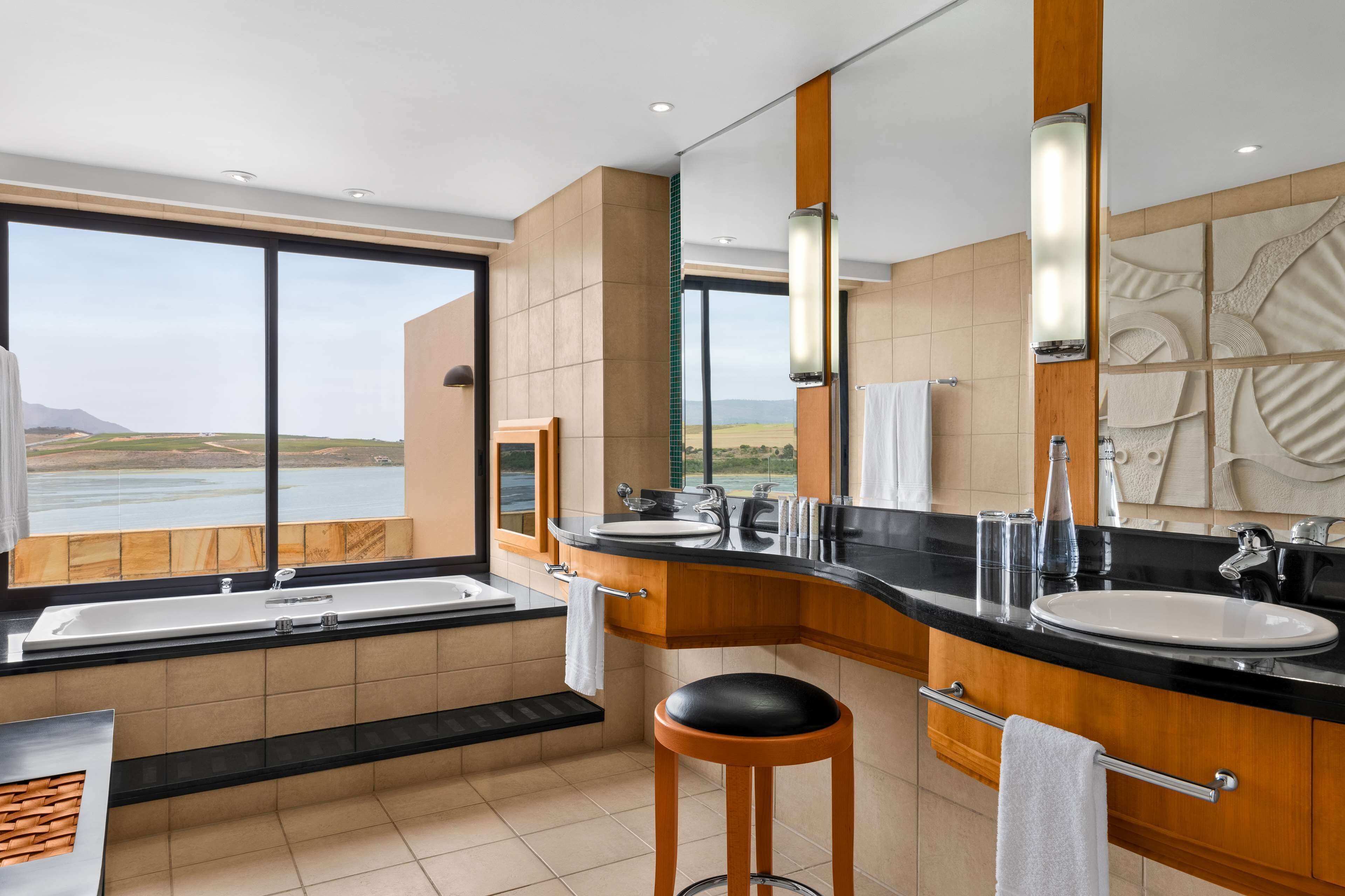 separate bathtub and shower, designer toiletries, hair dryer