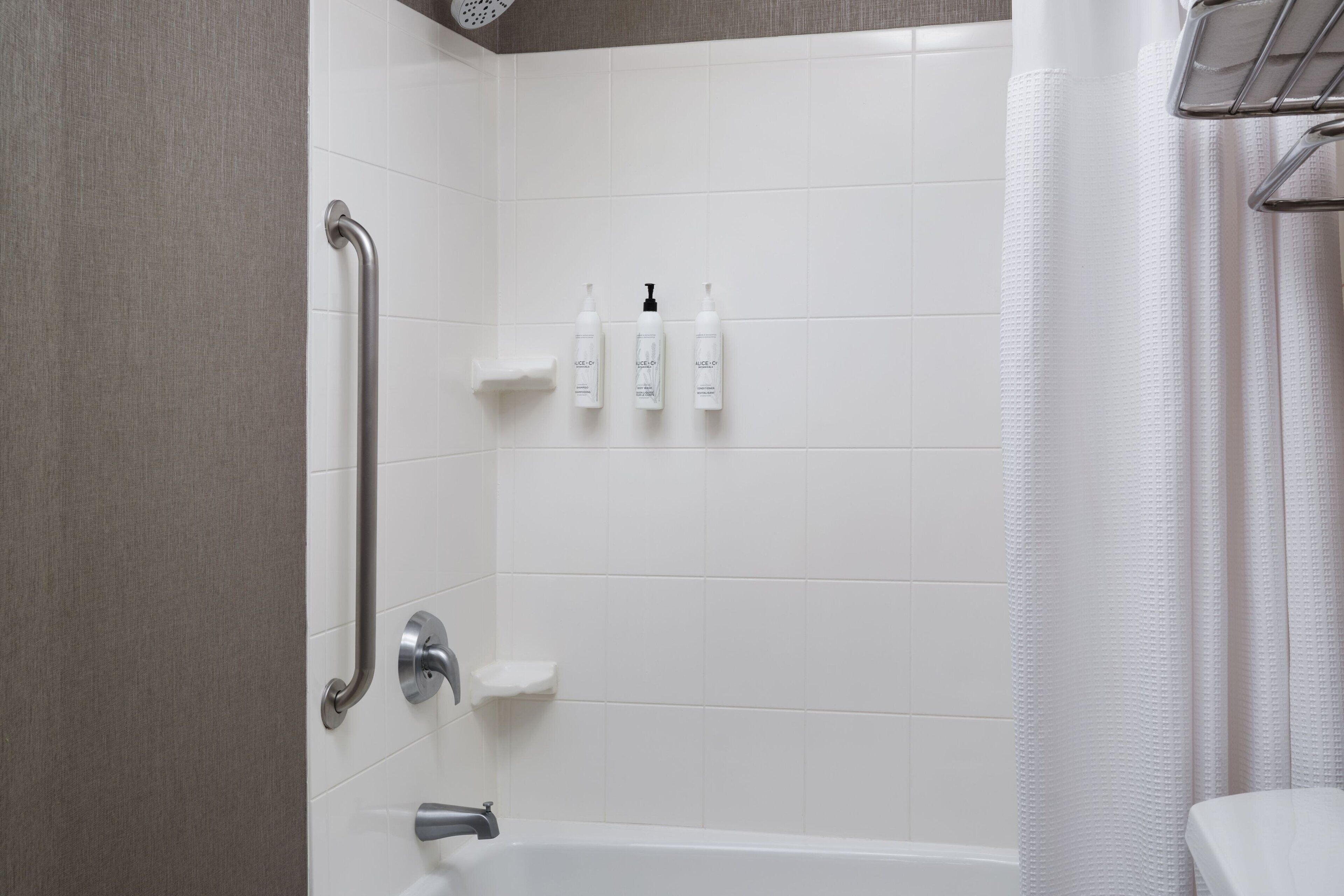 combined shower/bathtub, free toiletries, hair dryer, towels