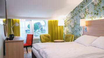 Pillow-top beds, minibar, desk, blackout curtains