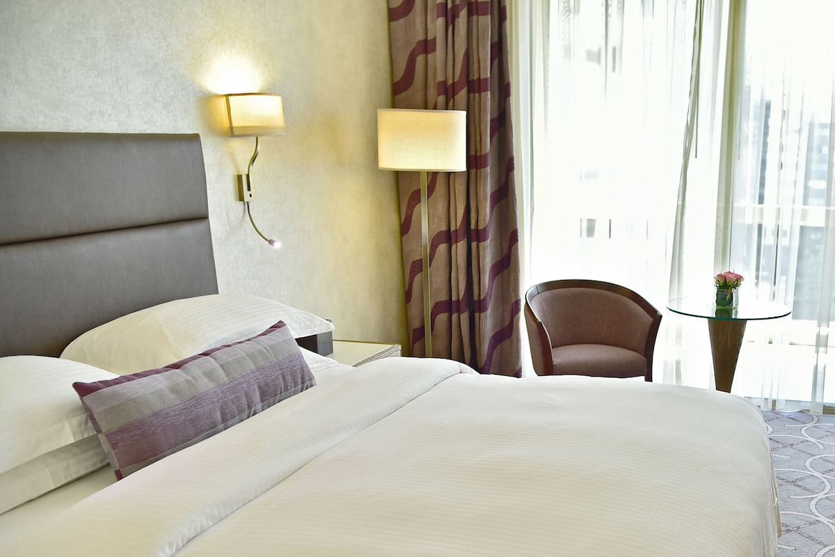 Suite, 1 Bedroom, Club Lounge Access, City View | Minibar, in-room safe, desk, blackout drapes