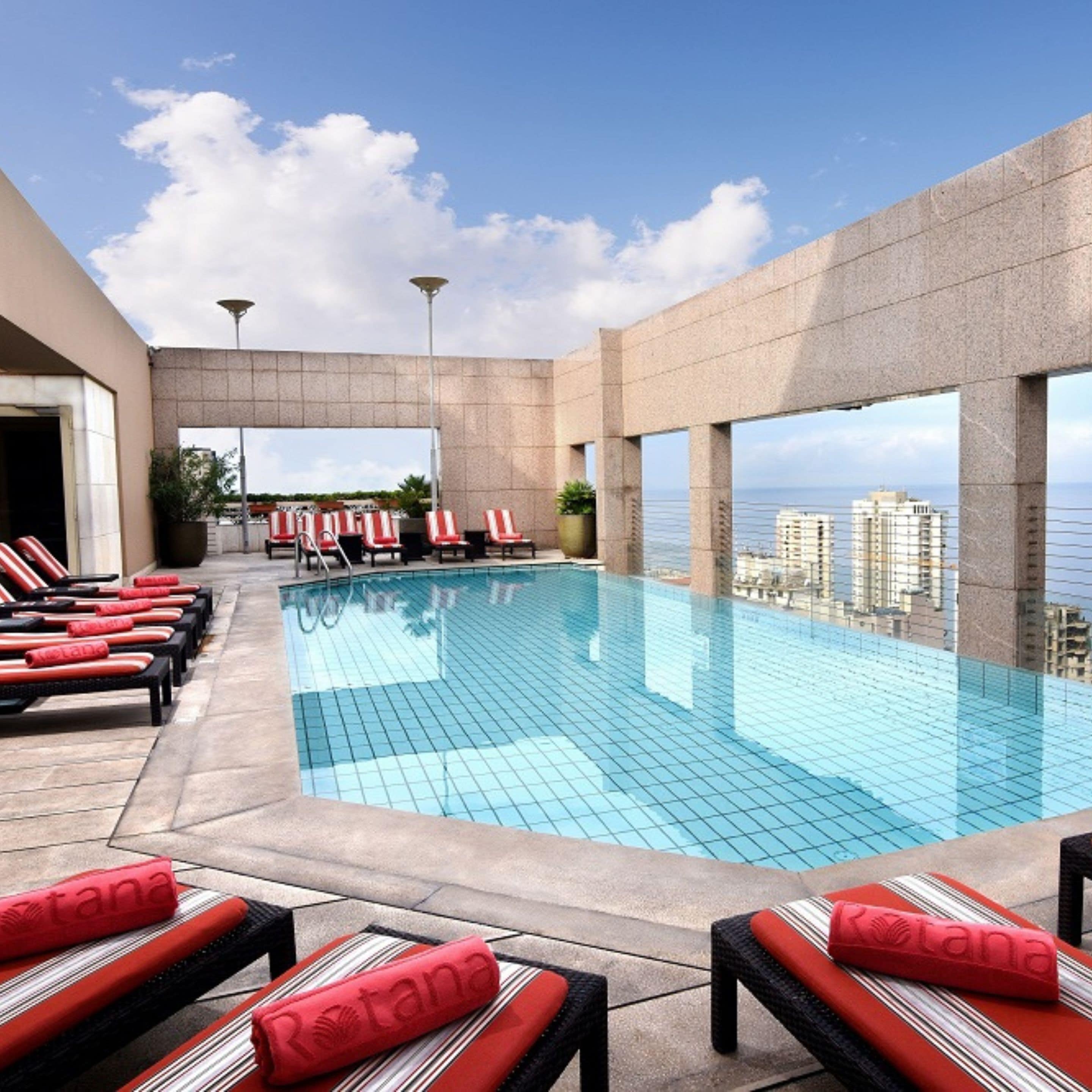 Outdoor pool, open 6:30 AM to 10:30 PM, pool umbrellas, sun loungers