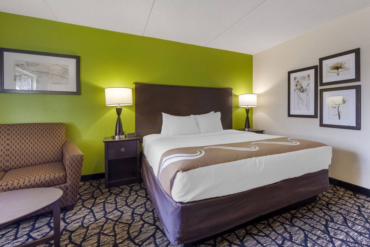 Desk, laptop workspace, iron/ironing board, cribs/infant beds