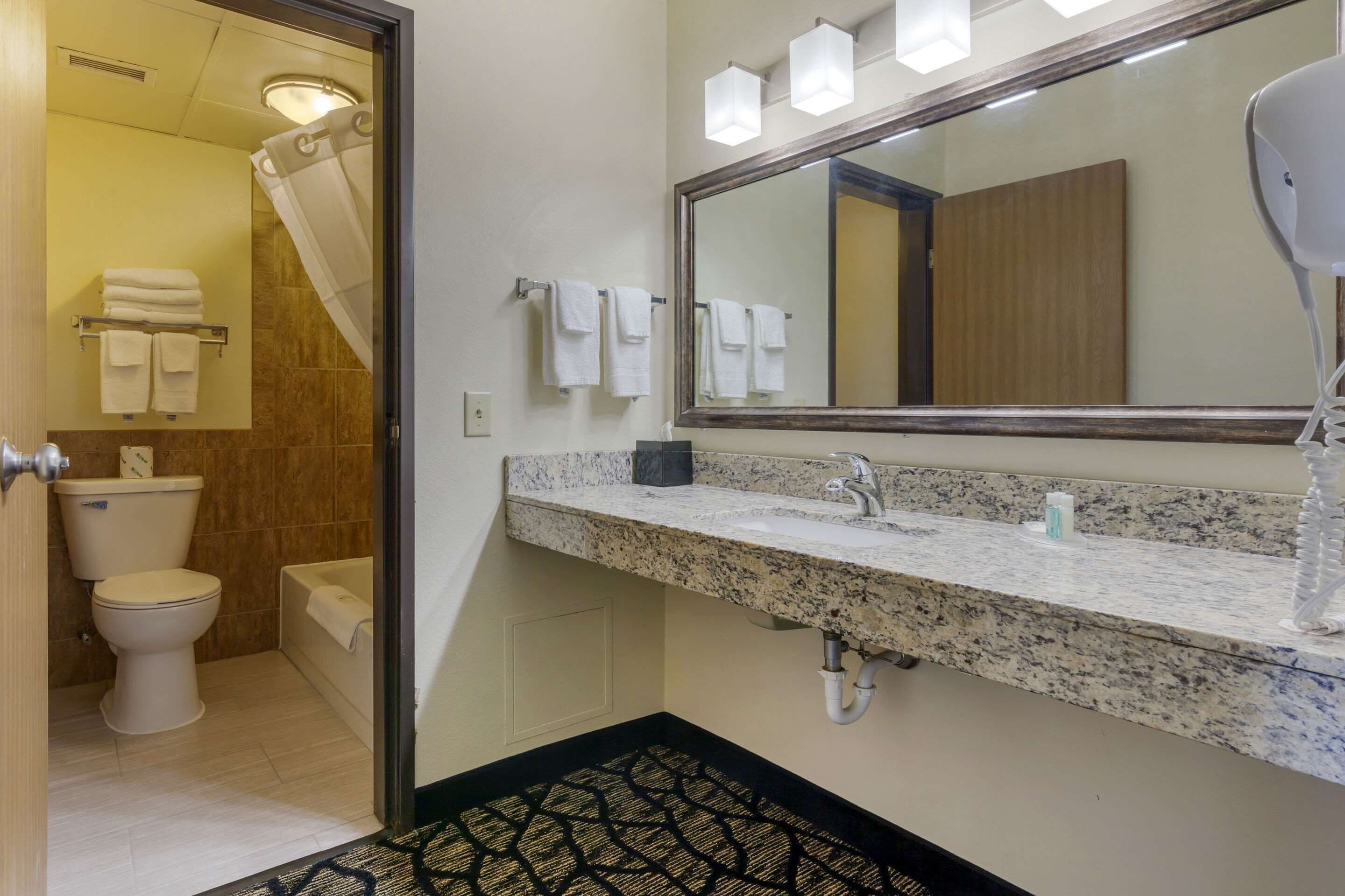 desk, laptop workspace, iron/ironing board, cots/infant beds