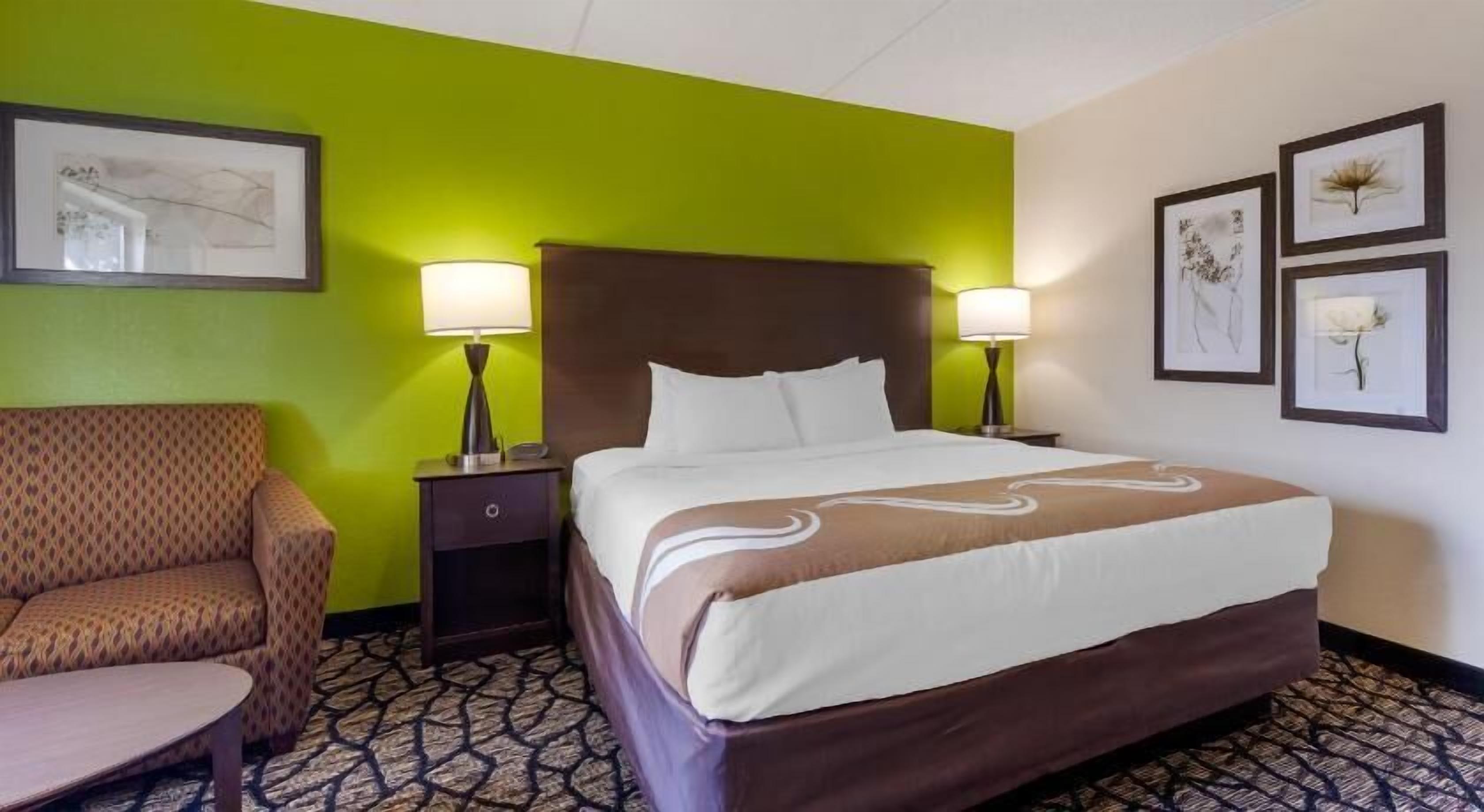 Desk, laptop workspace, iron/ironing board, cribs/infant beds