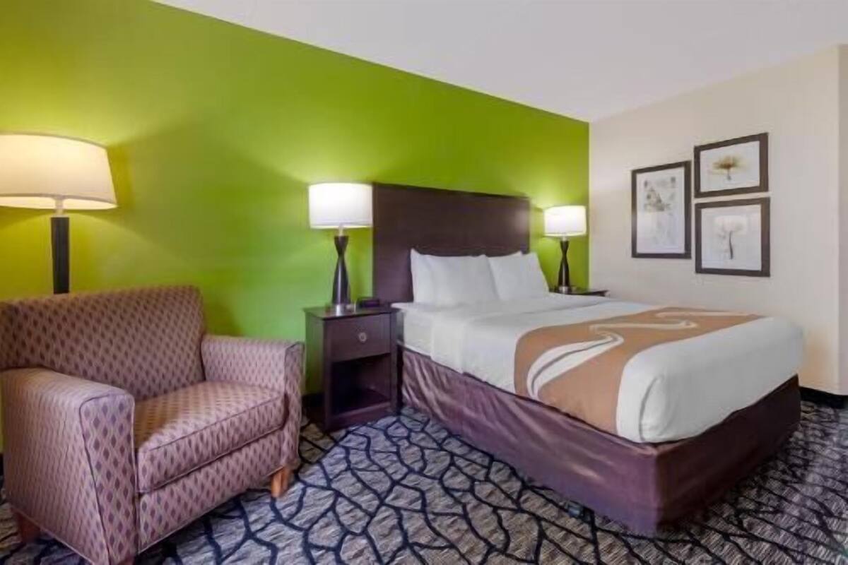 Desk, laptop workspace, iron/ironing board, cribs/infant beds