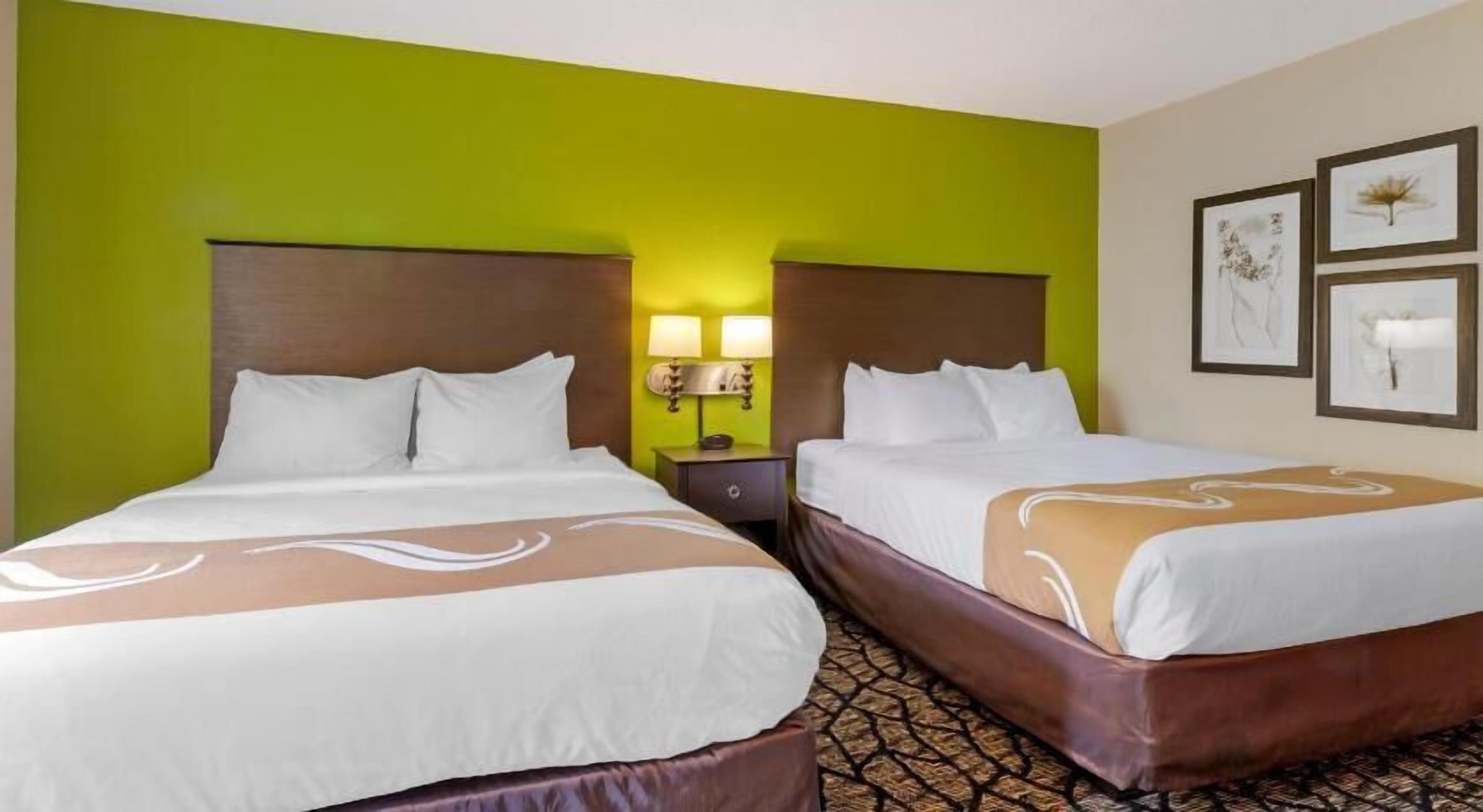 Desk, laptop workspace, iron/ironing board, cribs/infant beds