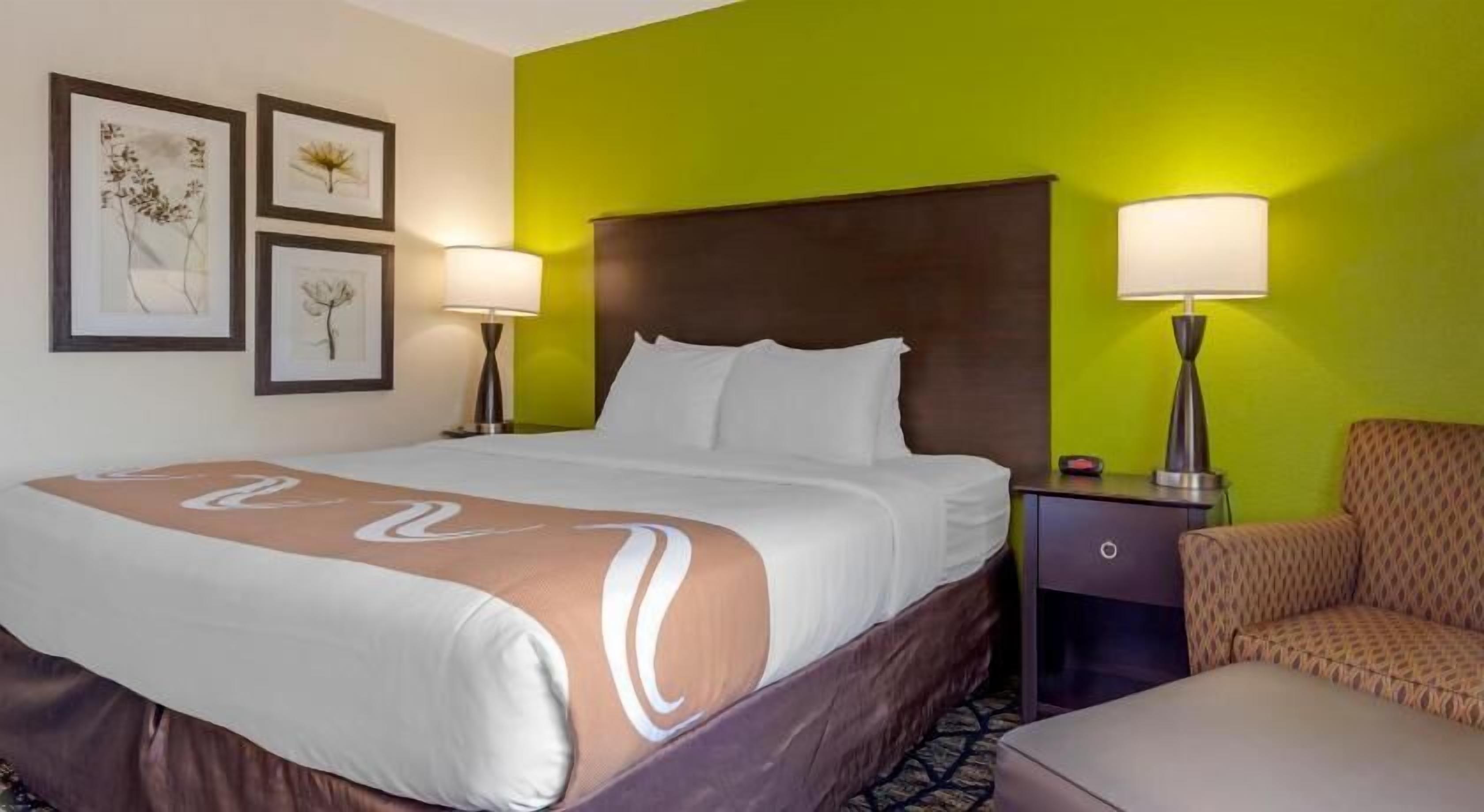 Desk, laptop workspace, iron/ironing board, cribs/infant beds