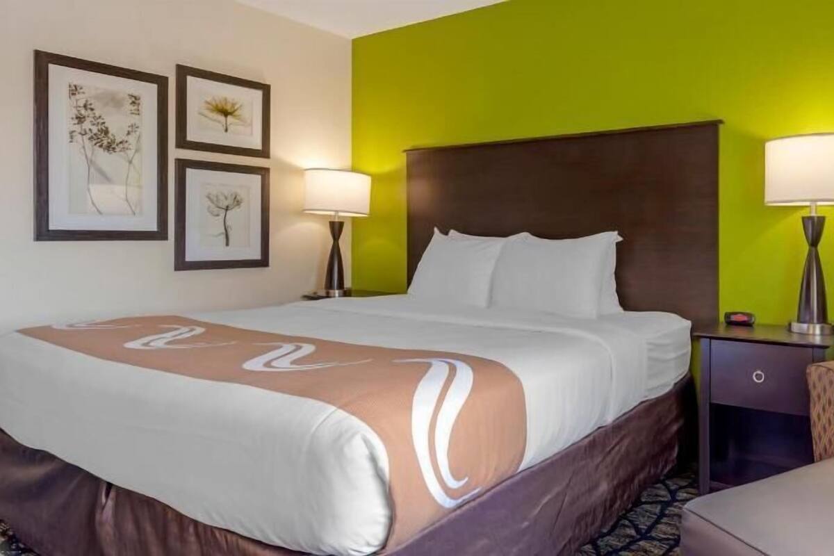 Desk, laptop workspace, iron/ironing board, cribs/infant beds